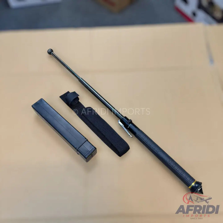 Black collapsible baton with a textured grip and a carrying case.