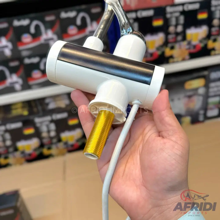 White electric water heater faucet with a digital display and a chrome-plated spout.