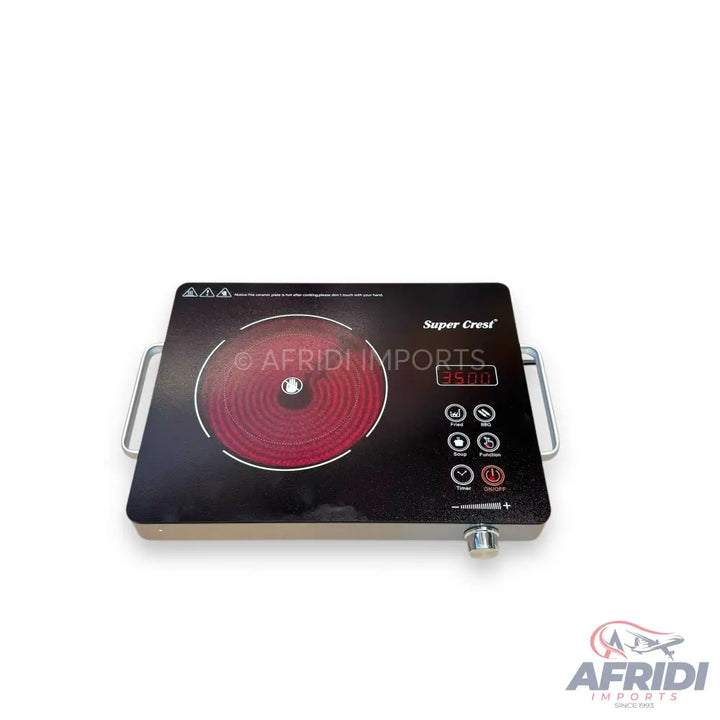 A black electric infrared cooktop with a single red heating element, digital display, and touch controls.