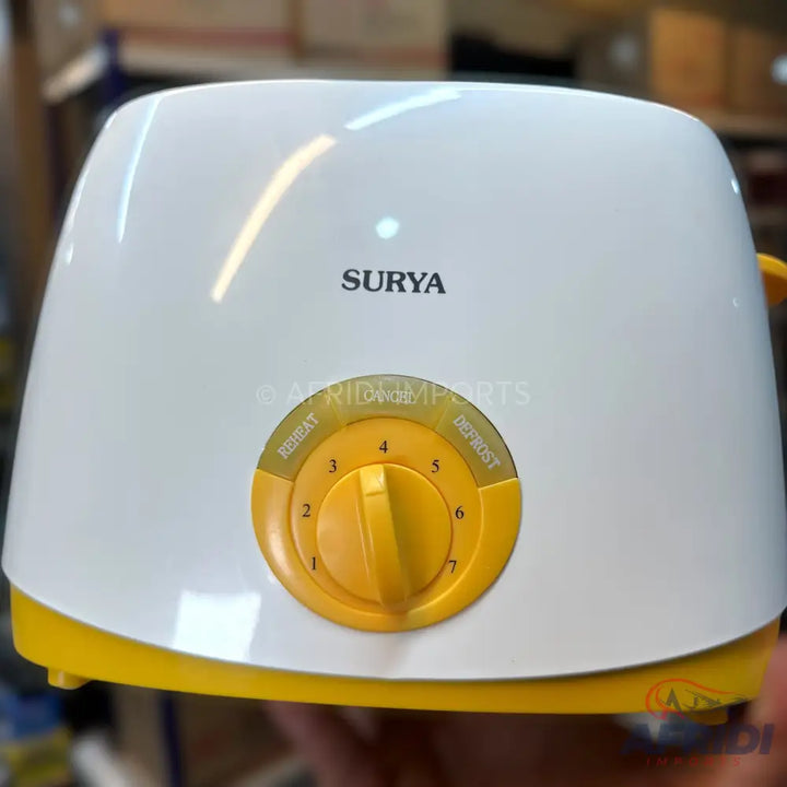 White and yellow toaster with a browning control dial.