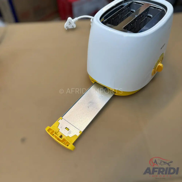 A white and yellow two-slice toaster with an extended crumb tray.