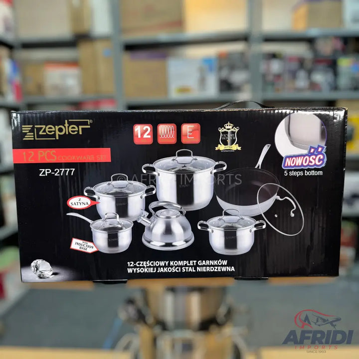 A 12-piece stainless steel cookware set in a black box.