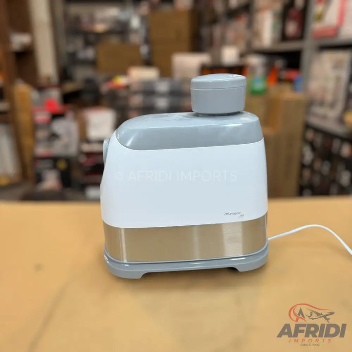 White and grey electric kitchen appliance with a metallic base.