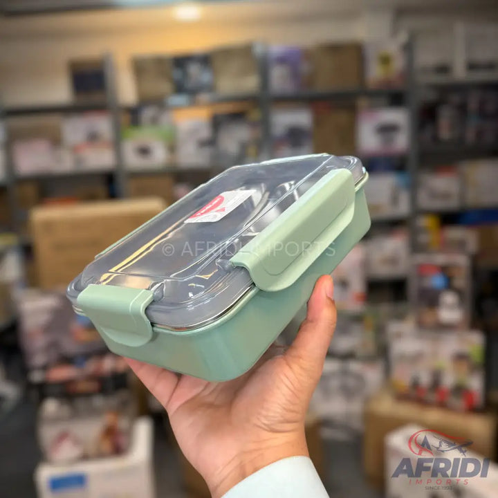 Mint green lunchbox with a clear, latching lid.