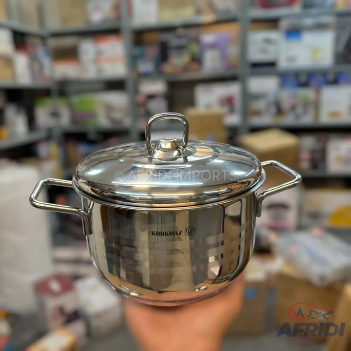 Stainless steel cooking pot with lid and two handles.