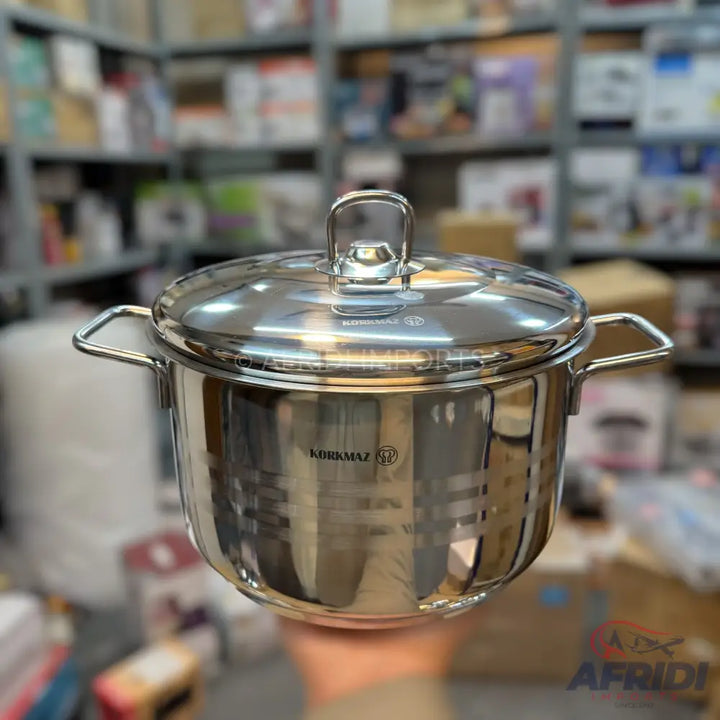 Shiny stainless steel cooking pot with a lid and two handles.