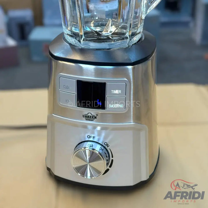 Stainless steel blender with a glass jar and multiple control settings.
