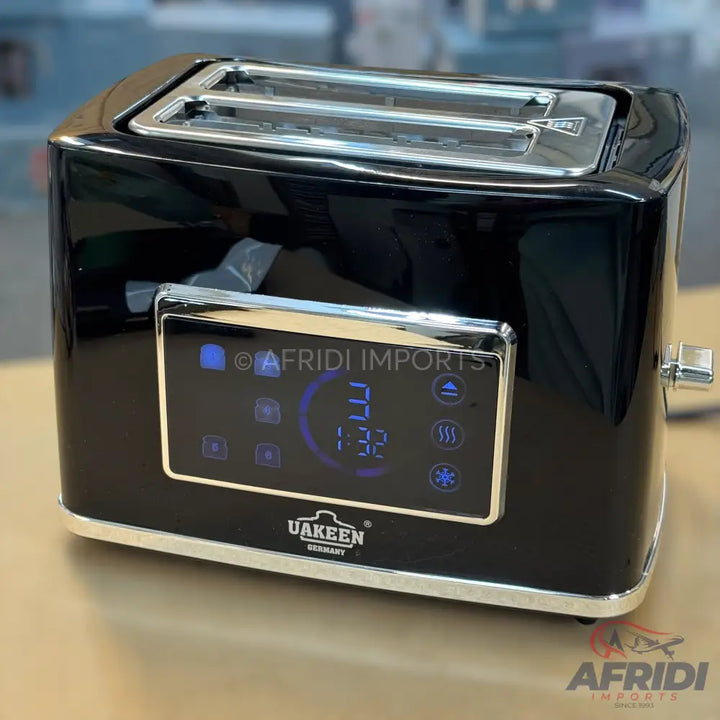 Black two-slice toaster with a digital display.