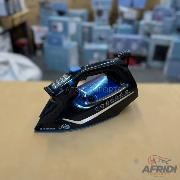Black and blue steam iron with a textured grip.