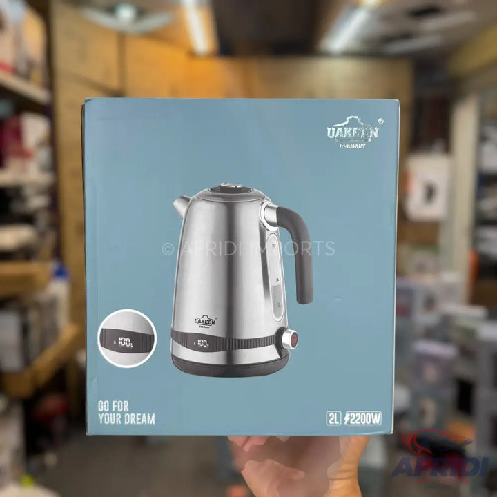 A stainless steel electric kettle with a black handle and base, featuring a water level indicator and a power switch, available in a 2L capacity and 2200W power.