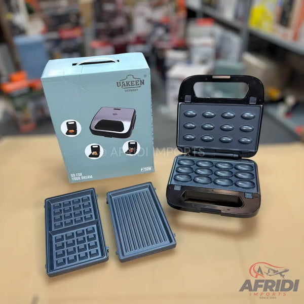 A 3-in-1 electric waffle, grill, and donut maker with interchangeable plates.