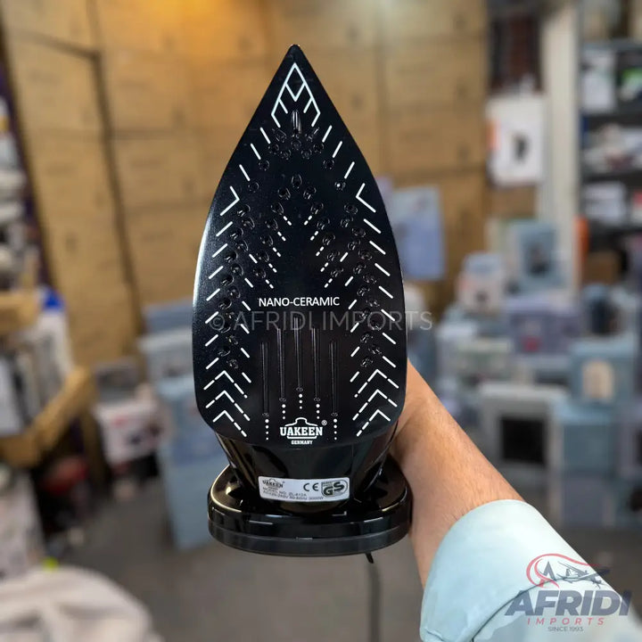 Black nano-ceramic soleplate of an iron.