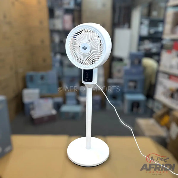 White, standing pedestal fan with a circular head and an adjustable stand.