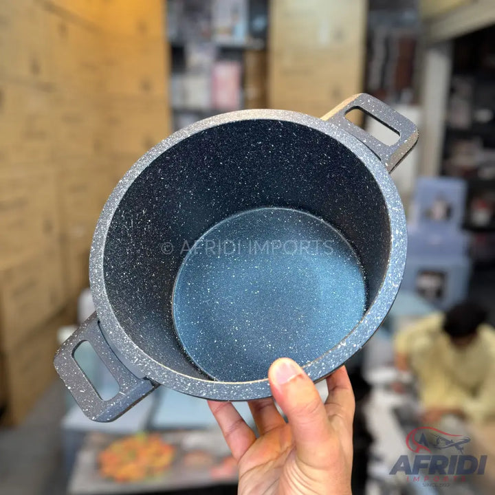 A gray speckled non-stick cooking pot with two handles.