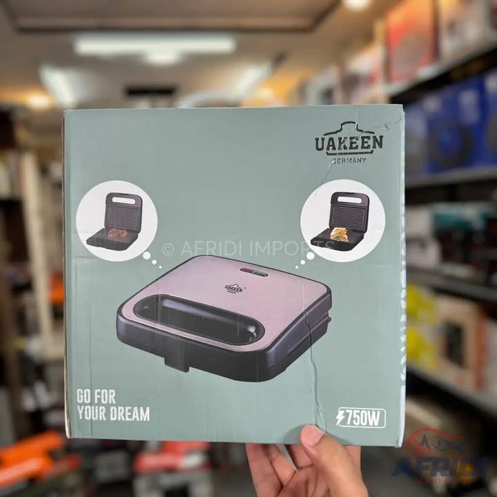 A sandwich maker with interchangeable plates for waffles and grilled sandwiches.