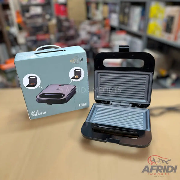 An open black electric sandwich maker with ridged non-stick cooking plates.