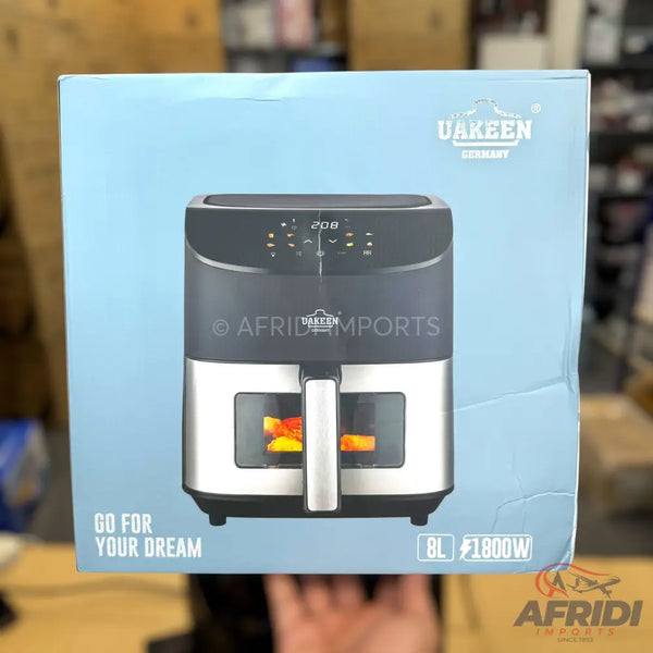 An 8L, 1800W air fryer with a visible cooking window.