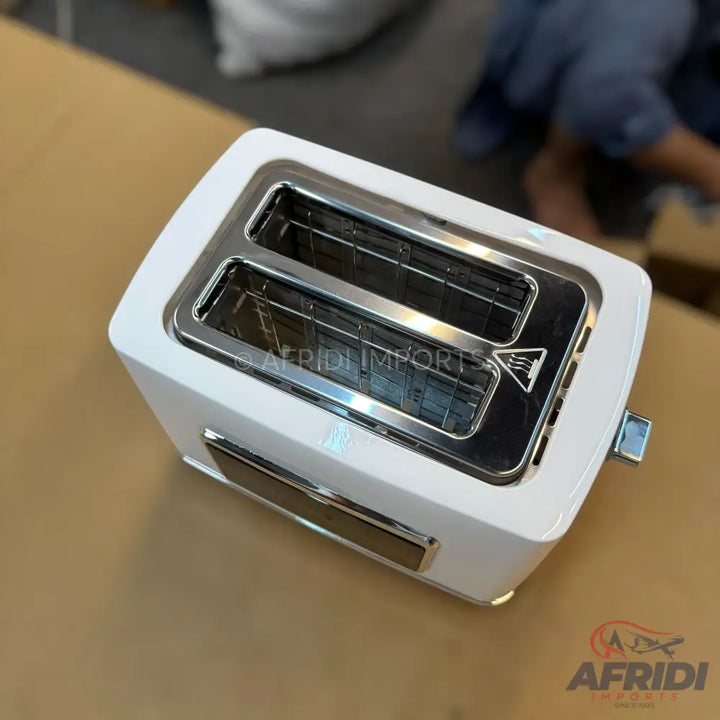 A white two-slice toaster with metallic accents.
