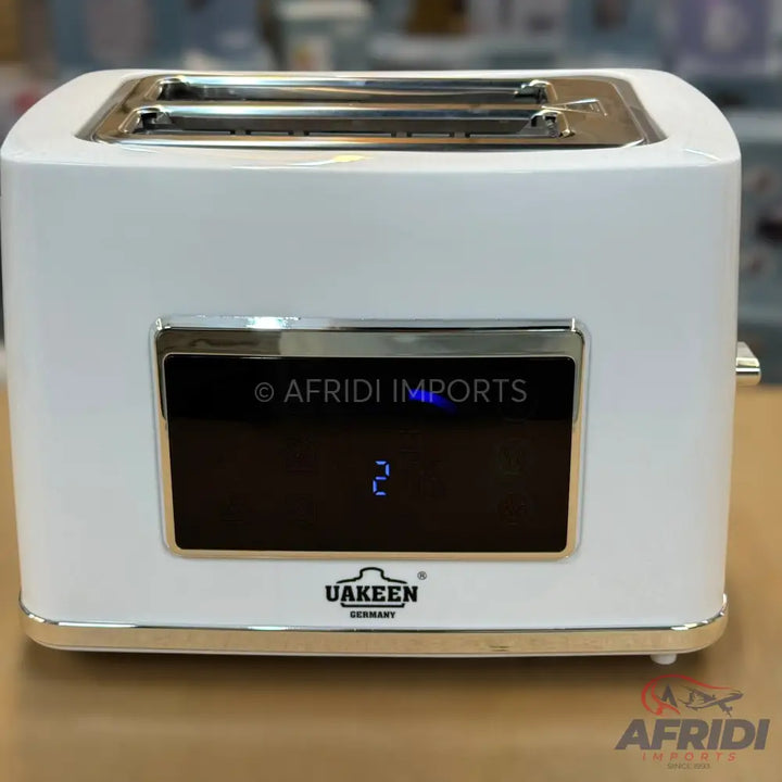 A white, two-slice toaster with a digital display.