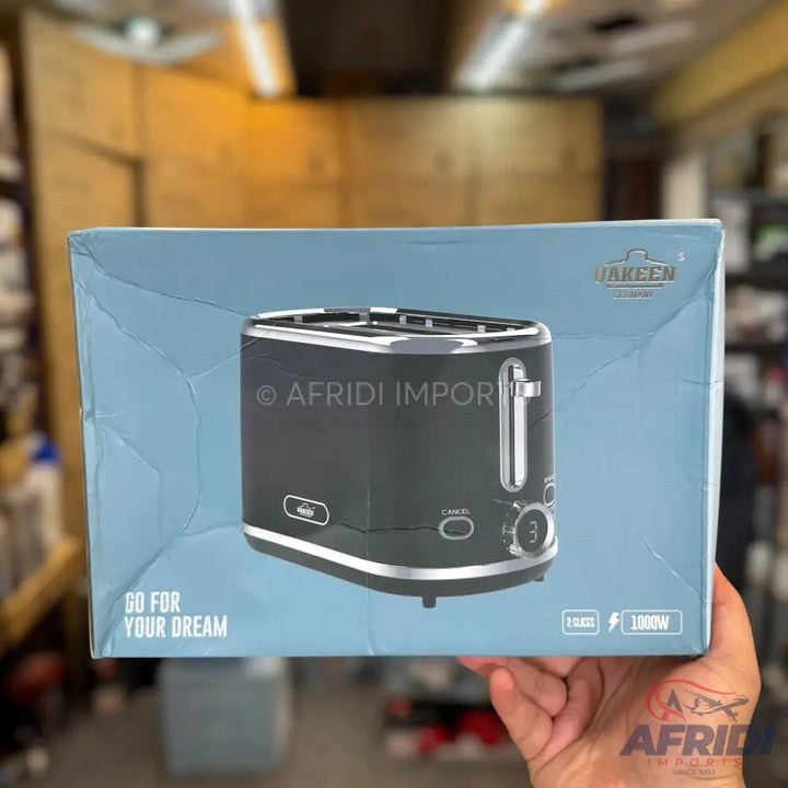 A black, 2-slice toaster with silver accents and a 1000W power rating.