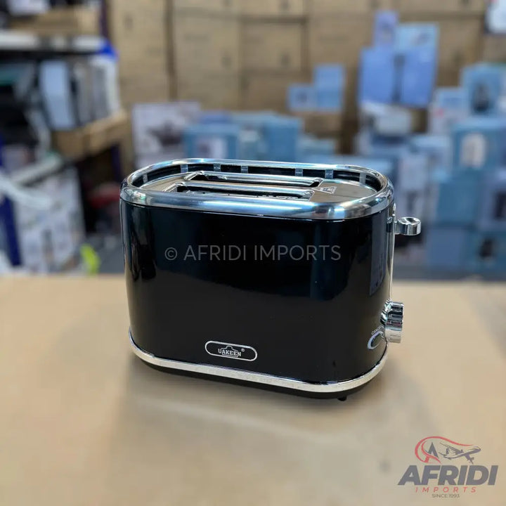 Black two-slice toaster with chrome accents.