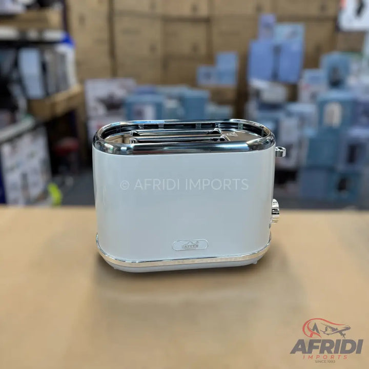 White two-slice toaster with chrome accents.