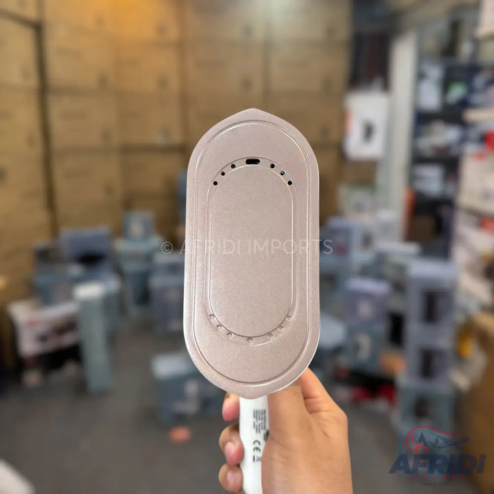 Handheld portable garment steamer.