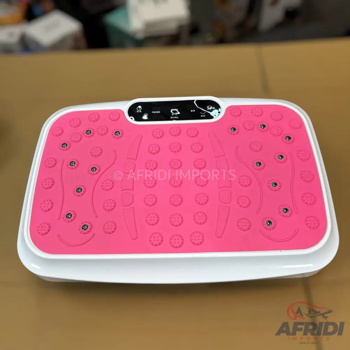 Pink vibration plate exercise machine.