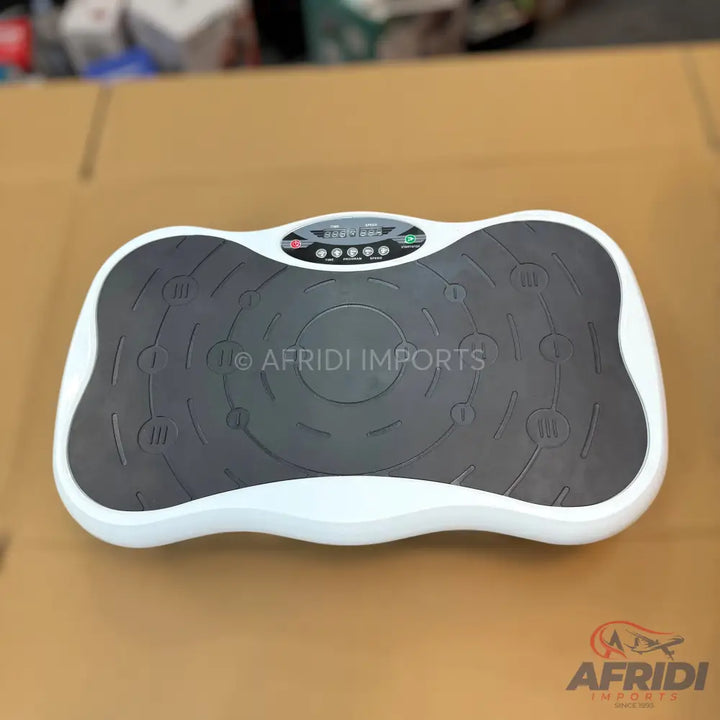 White and gray full-body vibration platform with a digital control panel.