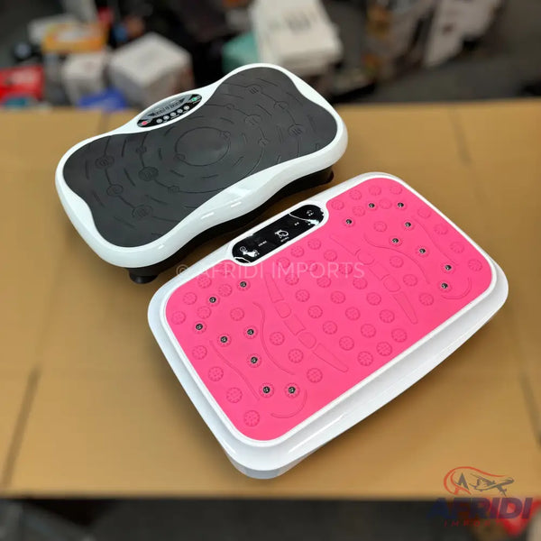Two vibratory exercise platforms, one black and one pink.