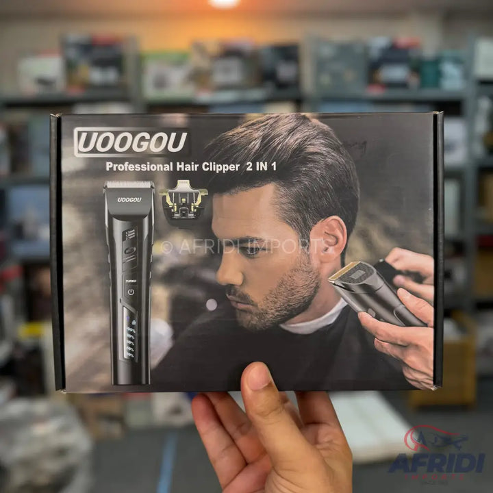 A UOOGOU professional 2-in-1 hair clipper set, featuring a dark-colored clipper with multiple settings and an additional attachment, packaged in a box displaying a man using the clipper.