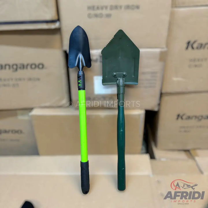 Two garden shovels, one with a bright green handle and the other a folding military-style shovel with a dark green handle.
