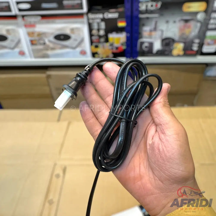 Black electrical cable with a white rectangular connector.
