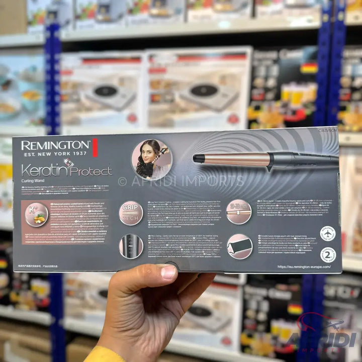 A Remington Keratin Protect curling wand in its retail box.