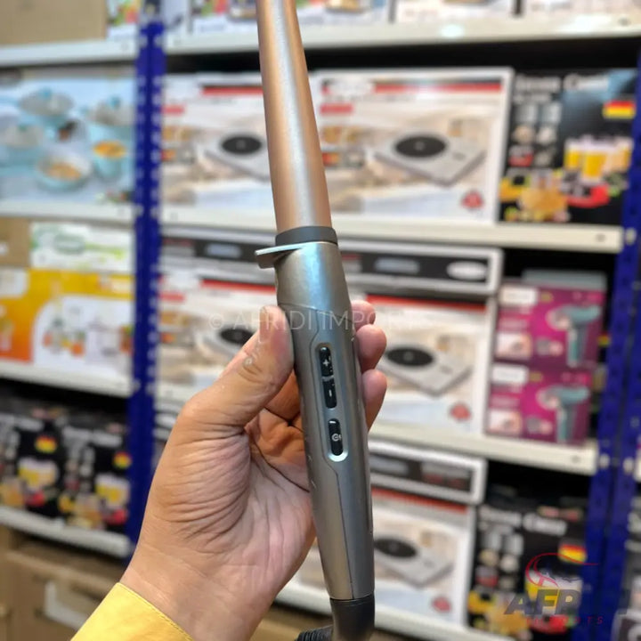 A metallic brown and grey conical curling iron with multiple control buttons.