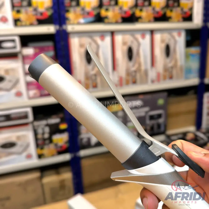 Silver-colored hair curling iron with a black tip and handle.