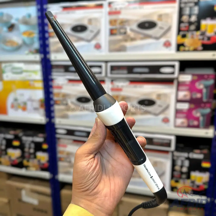 Black tapered curling iron with a white band on the handle.