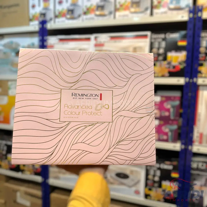 A Remington hair care product box with a wavy pattern.