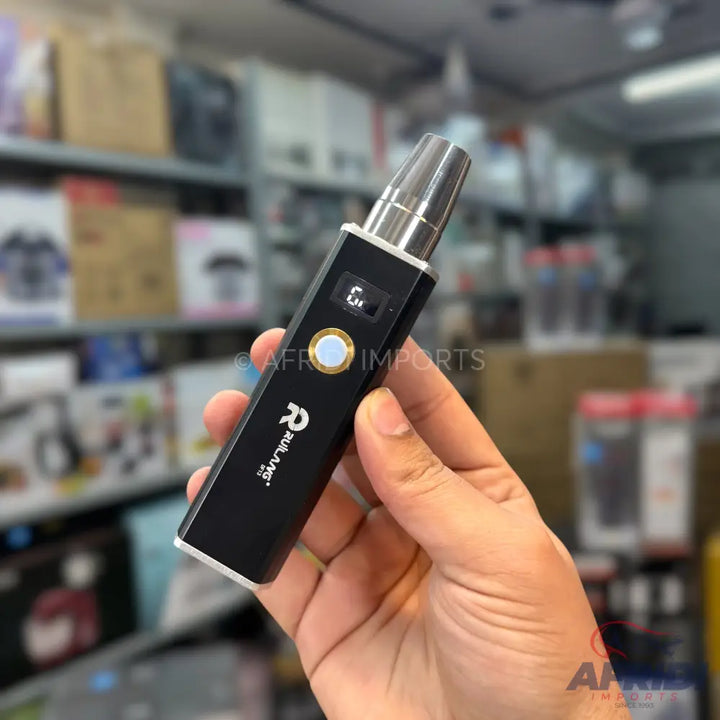 Black handheld vaporizer with a silver mouthpiece and a circular blue and gold button.