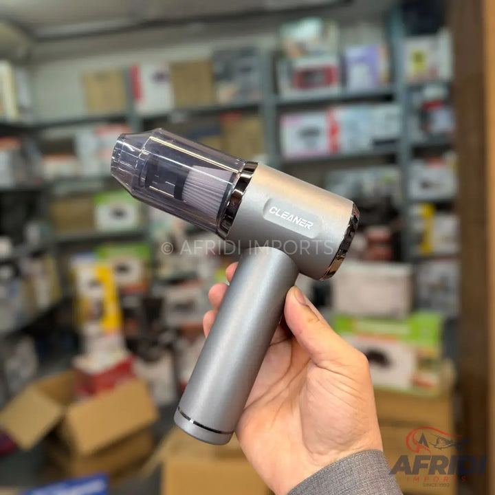 Handheld cordless car vacuum cleaner.