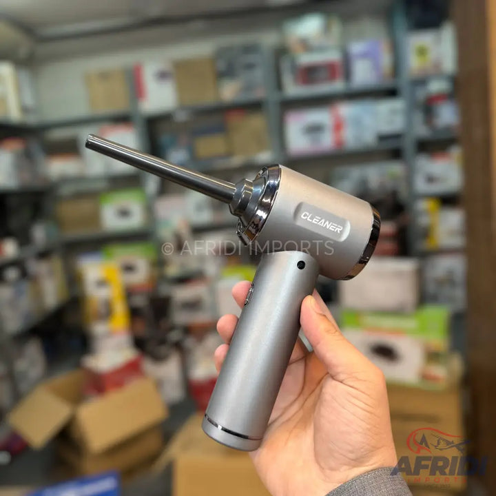 Handheld cordless electric air duster.