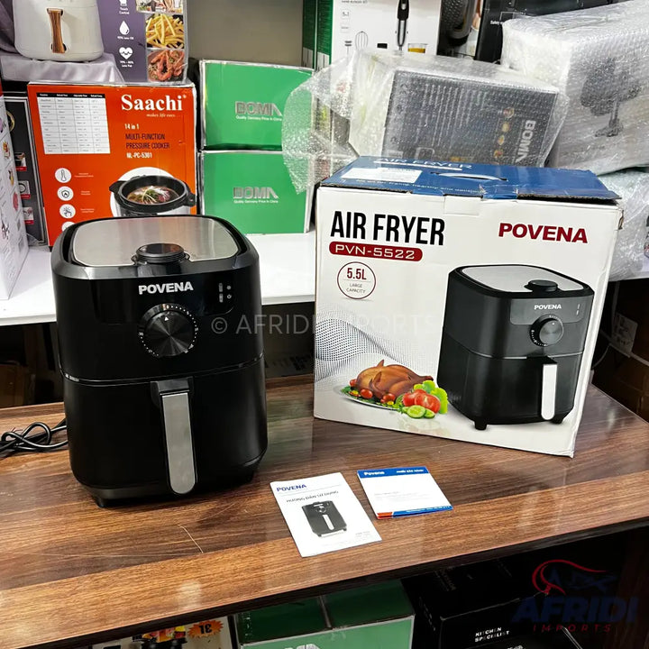 Black digital air fryer with a metallic top and a 5.5L capacity.