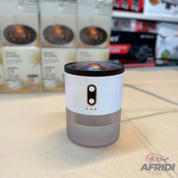 White and clear portable electric aroma diffuser with timer settings.