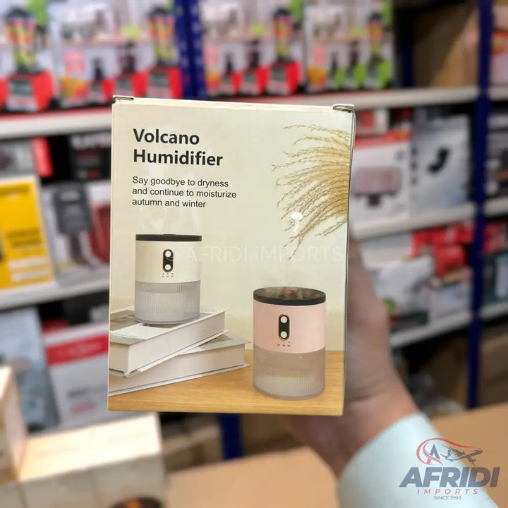 A boxed humidifier, available in white and pink, designed to moisturize the air.
