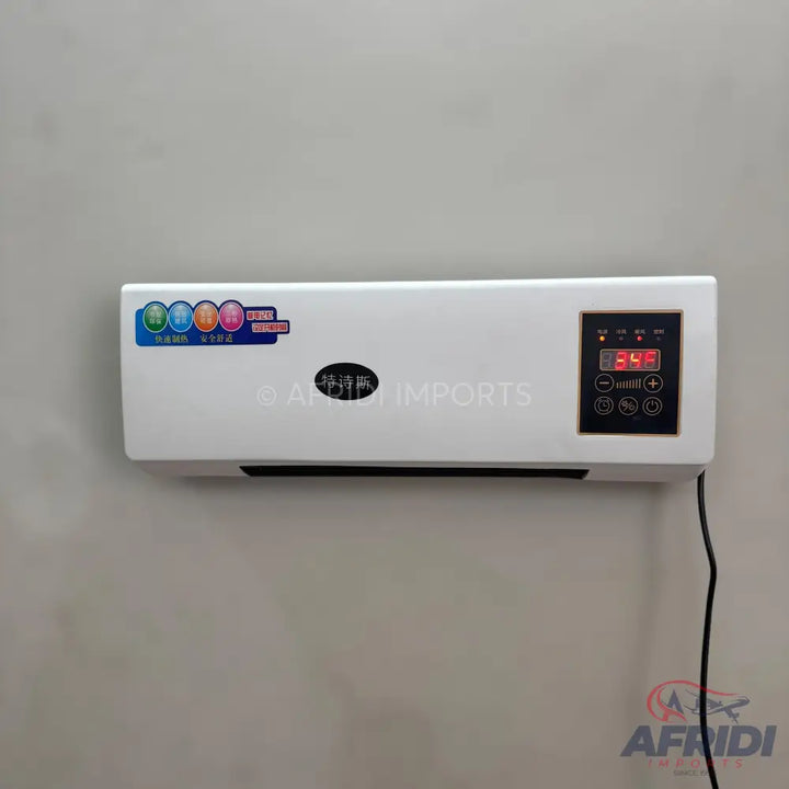 White wall-mounted electric heater with a digital display.