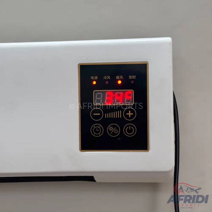 White wall-mounted air conditioner with a digital display and control panel.
