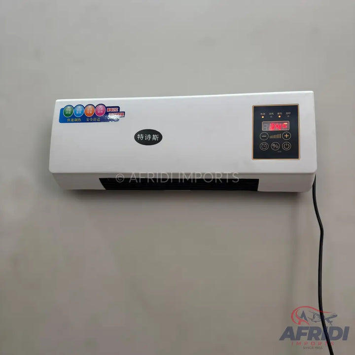 White wall-mounted electric heater with a digital display and control panel.