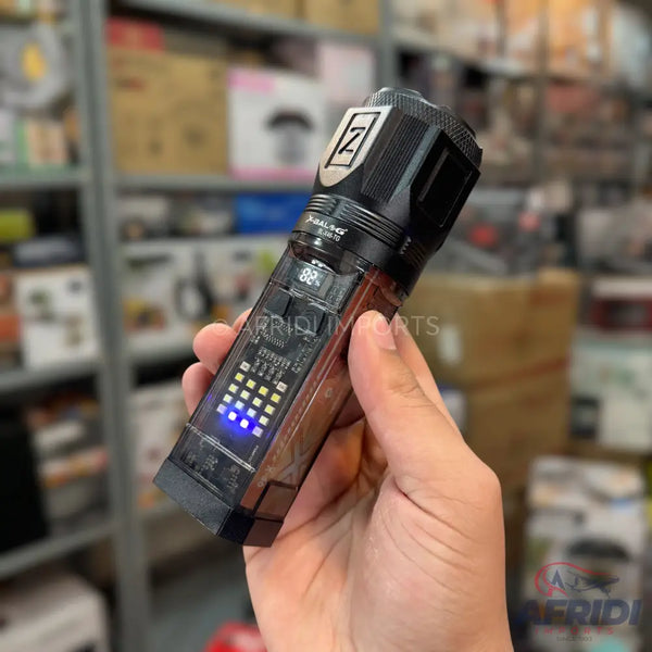 A black tactical flashlight with a digital display showing ’82%’ and a grid of illuminated LEDs, indicating battery level and possibly other functions.