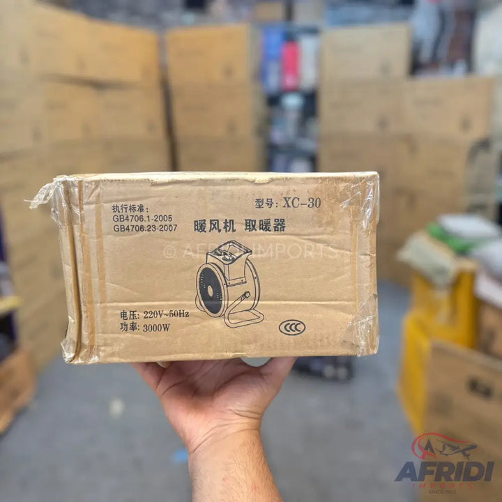 Boxed electric fan heater.