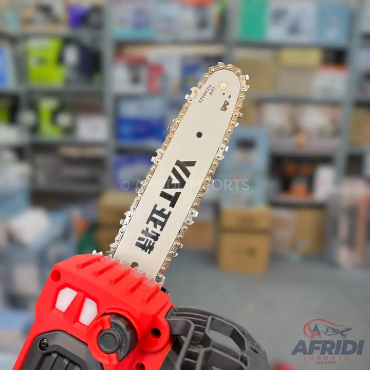 Red and black mini chainsaw with a silver chain.